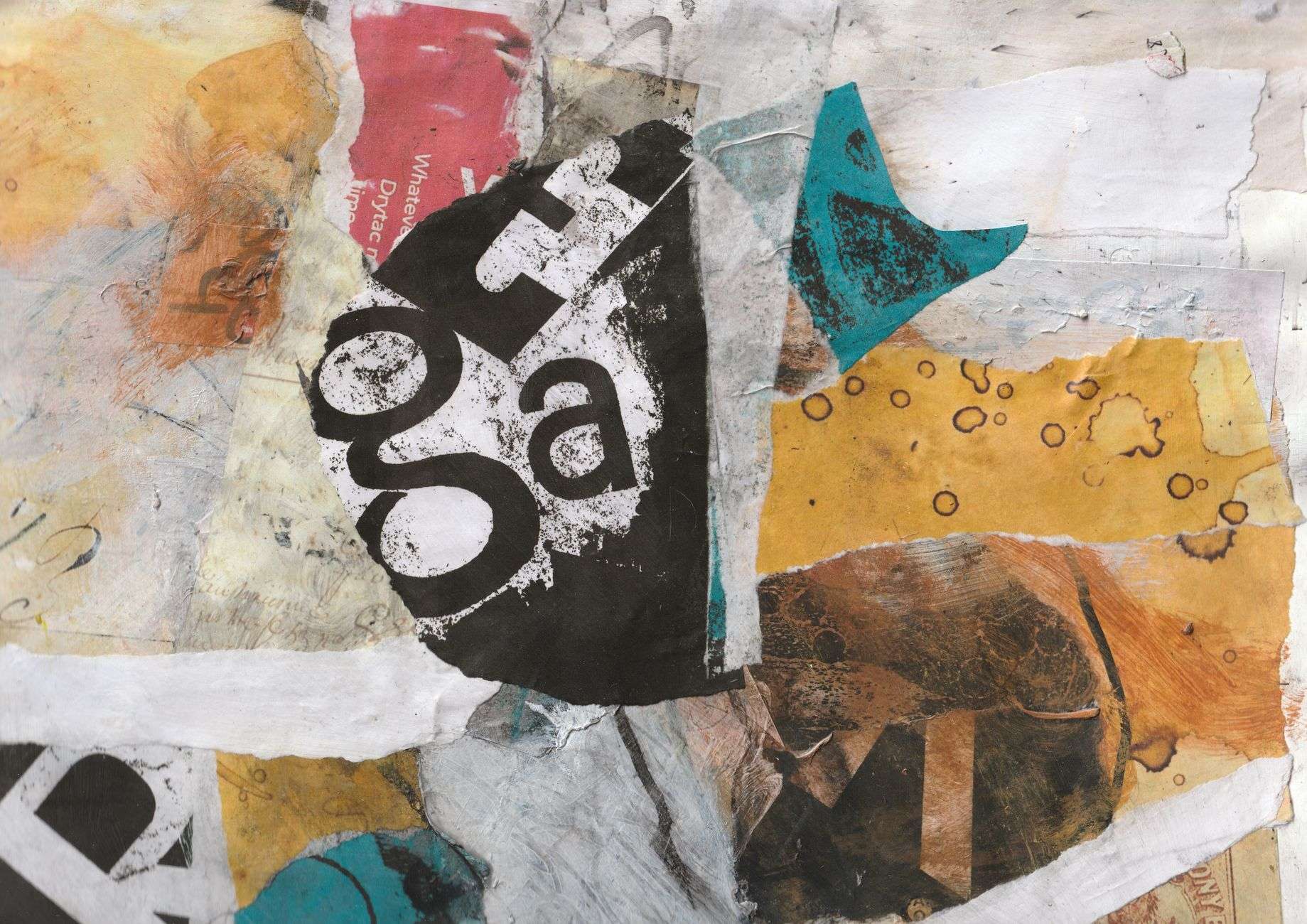 Close-up of a colorful abstract paper collage with torn paper textures and layered shapes