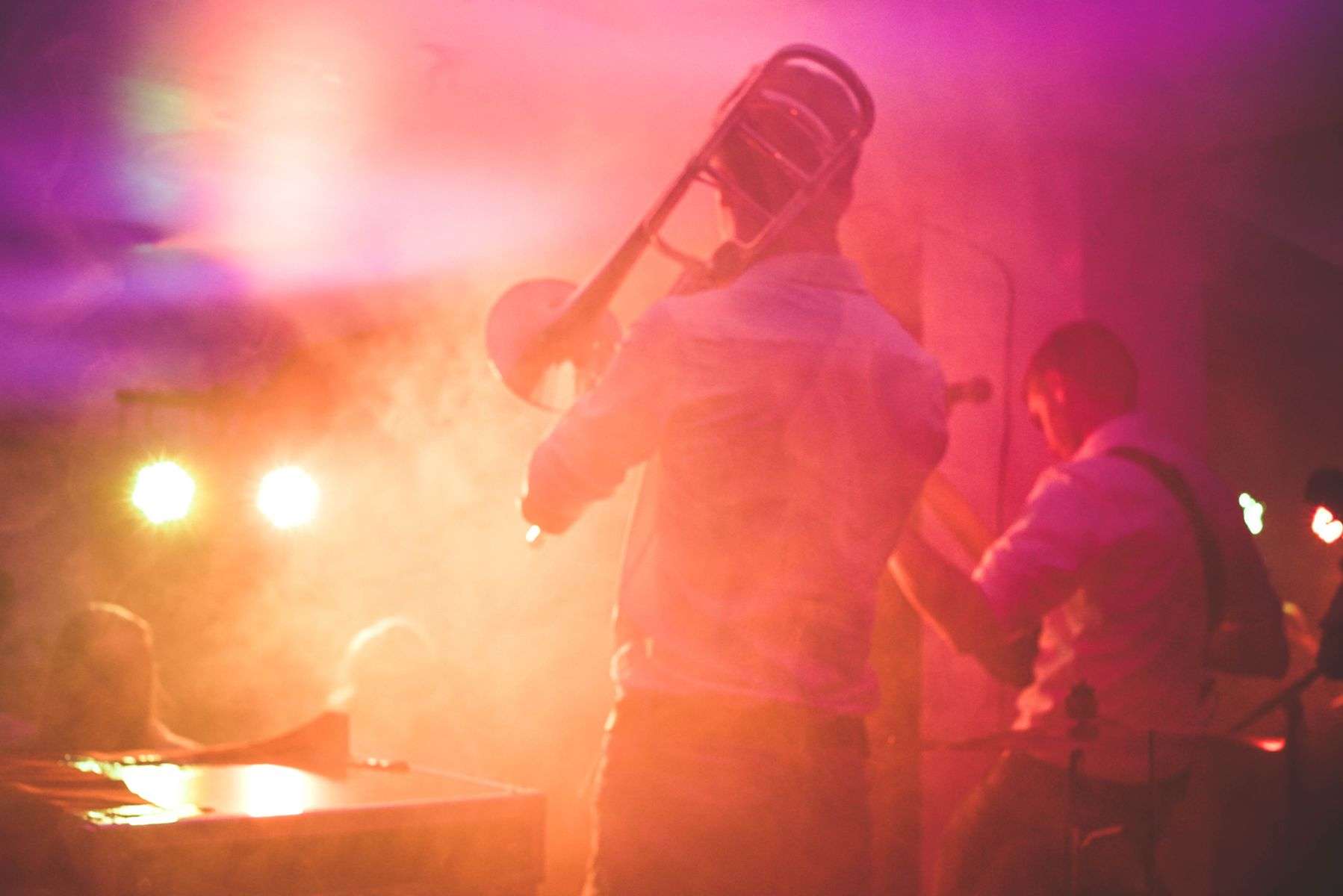 Close-up of a trombone being played by a jazz musician