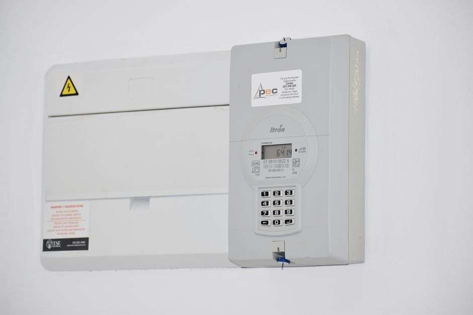 Home utility meter representing energy assistance programs
