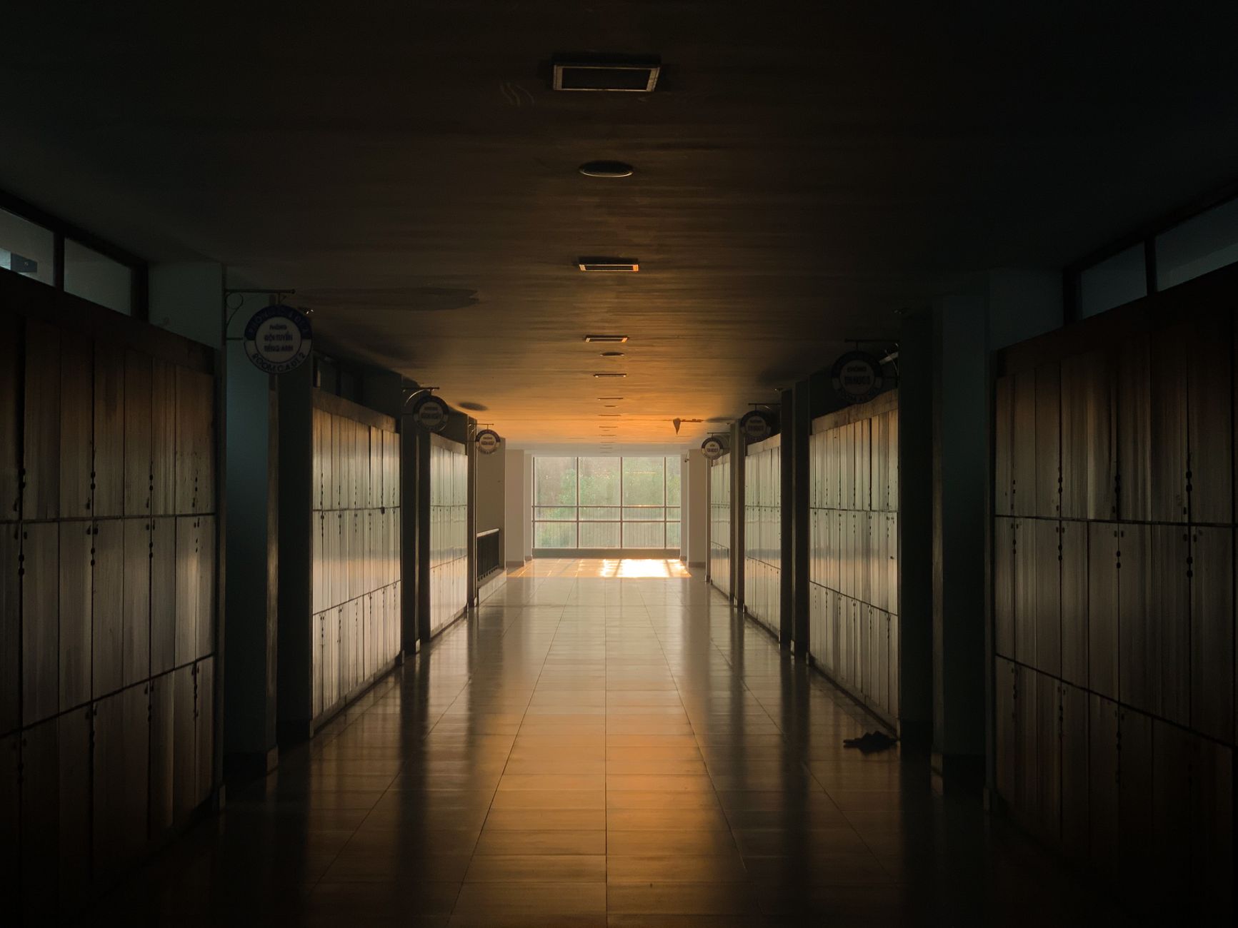 A high school hallway lined with lockers