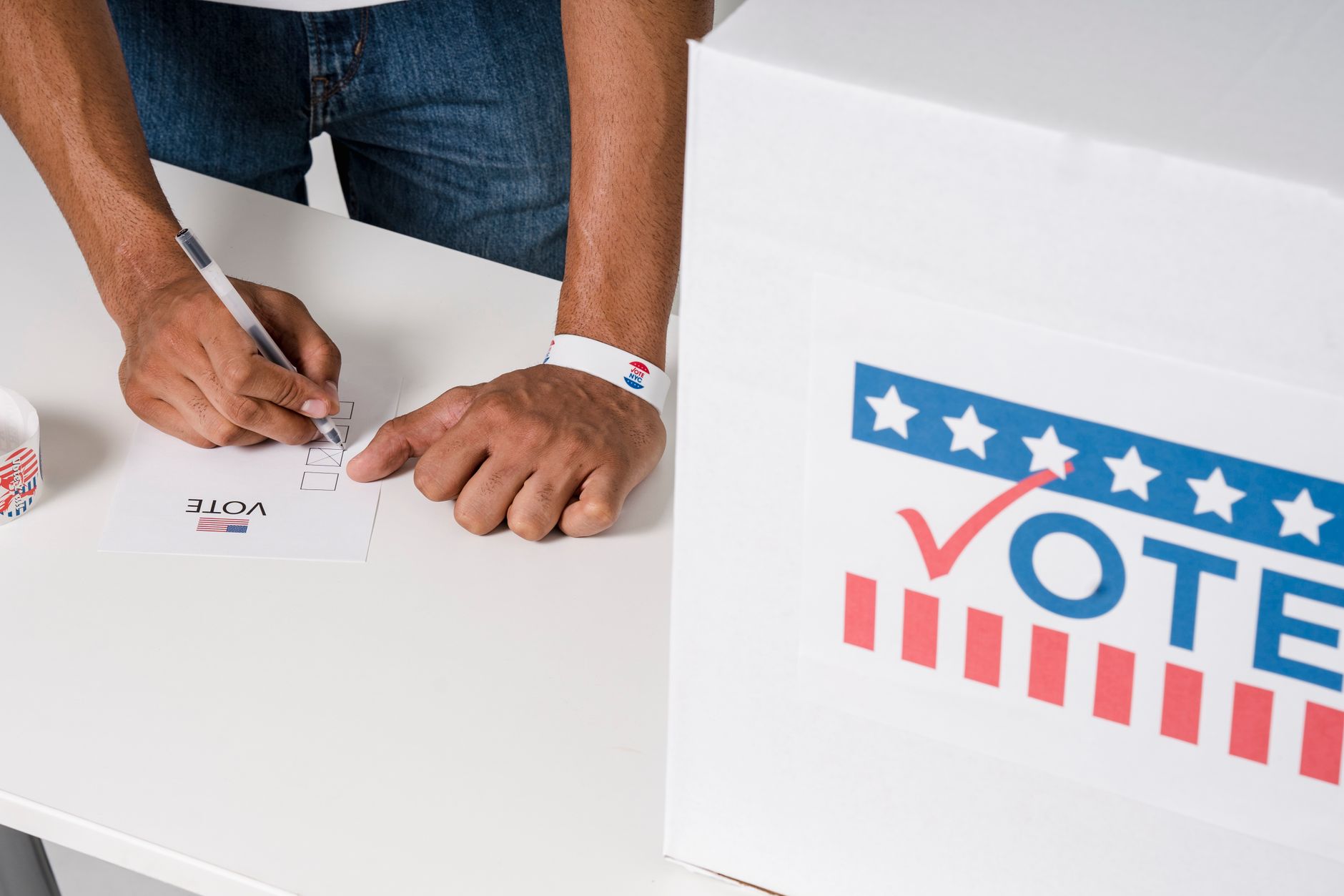 A voter casting a ballot at a polling place