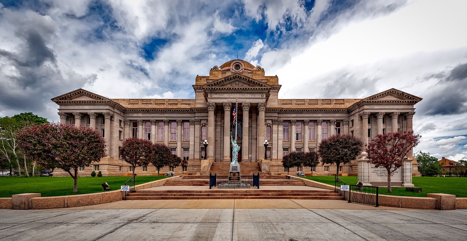 The columned facade of a county courthouse