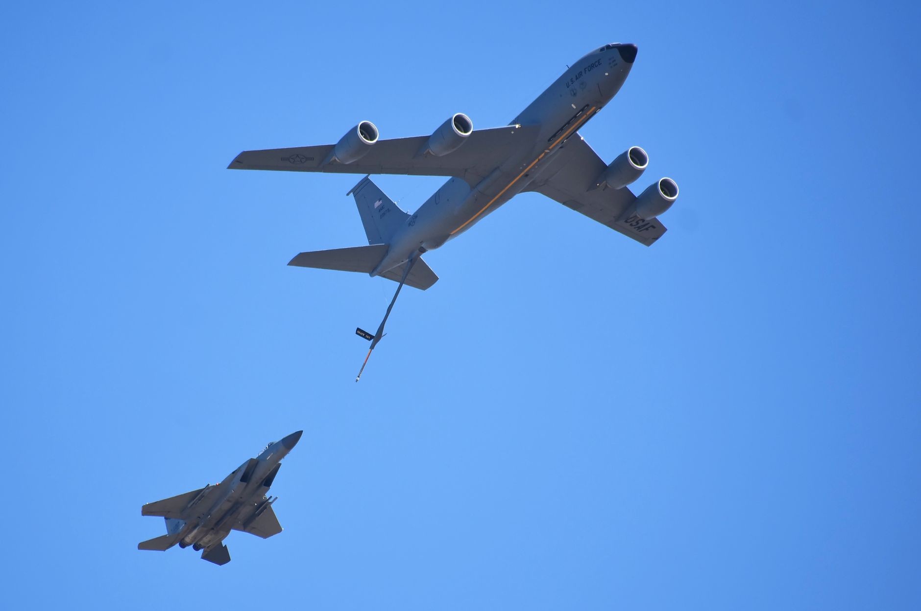 A military aerial refueling tanker aircraft in flight