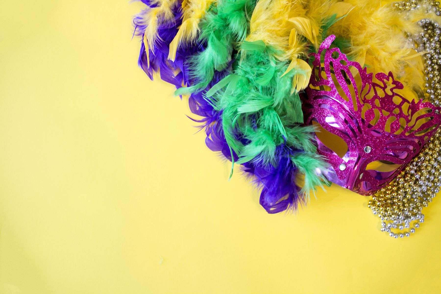 Colorful beads and festive Mardi Gras parade scene
