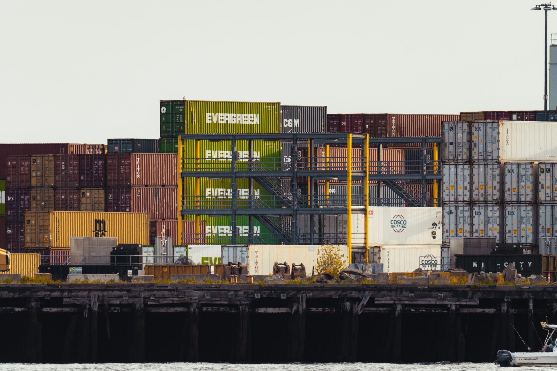 Refrigerated warehouse and shipping containers at a port
