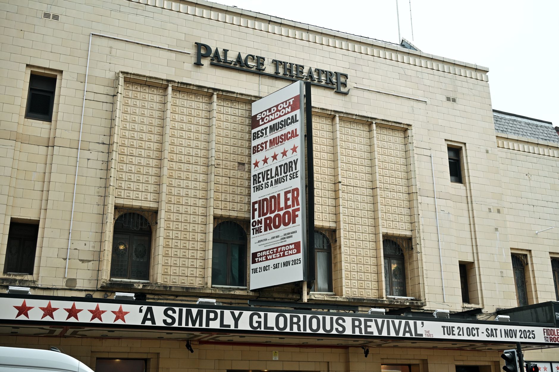 Historic theatre interior with ornate stage and seating