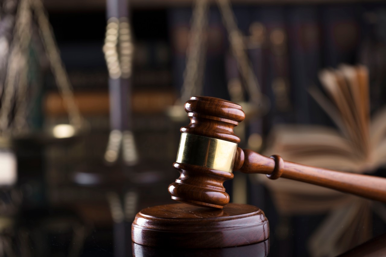 A courtroom gavel representing a federal criminal case