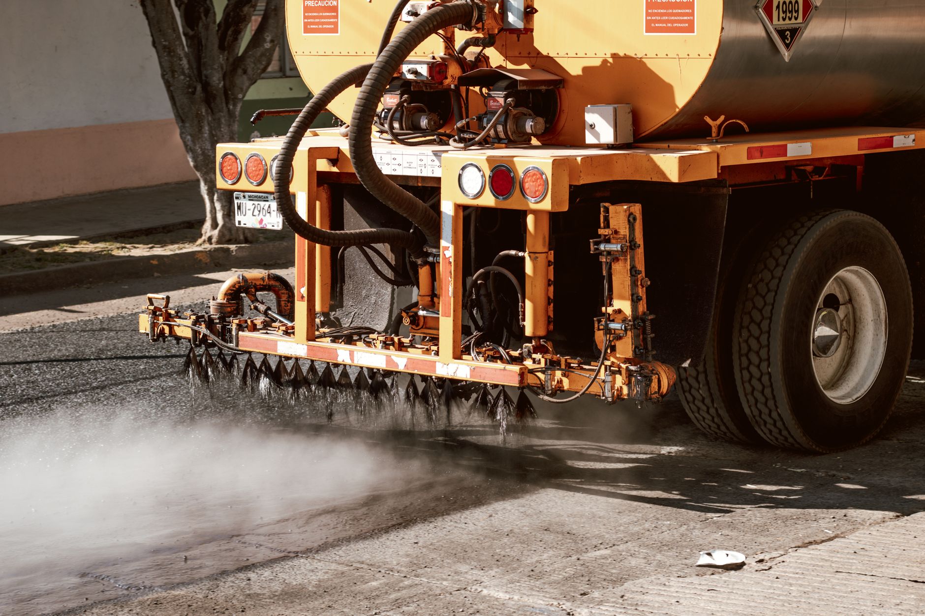 A mosquito control fogging operation at dusk