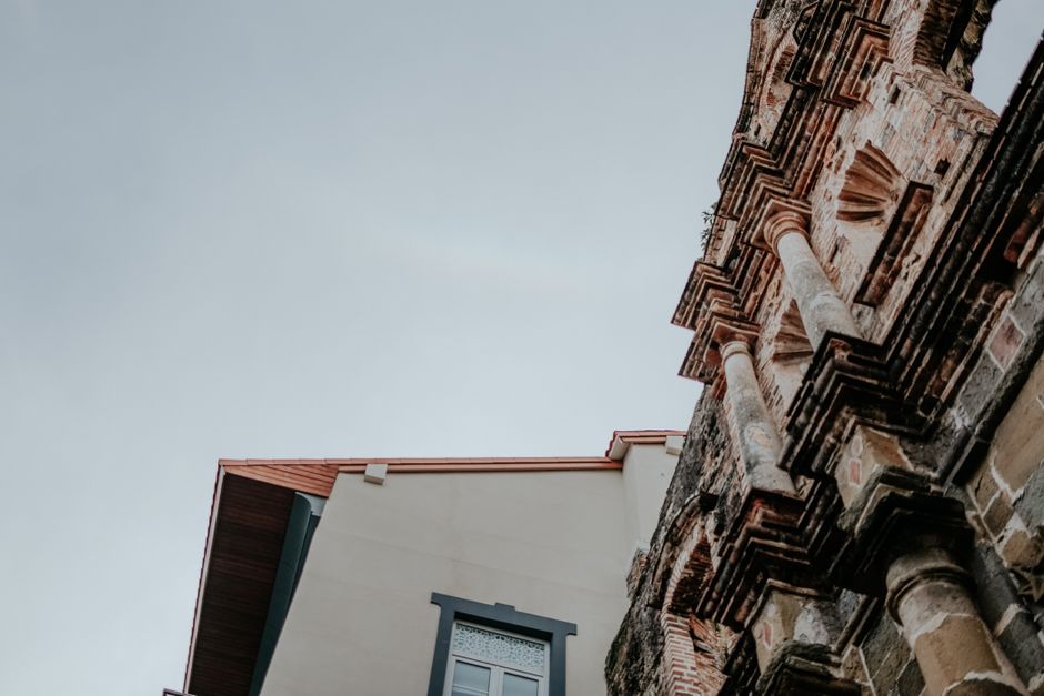 Historic school building with columns and a dome
