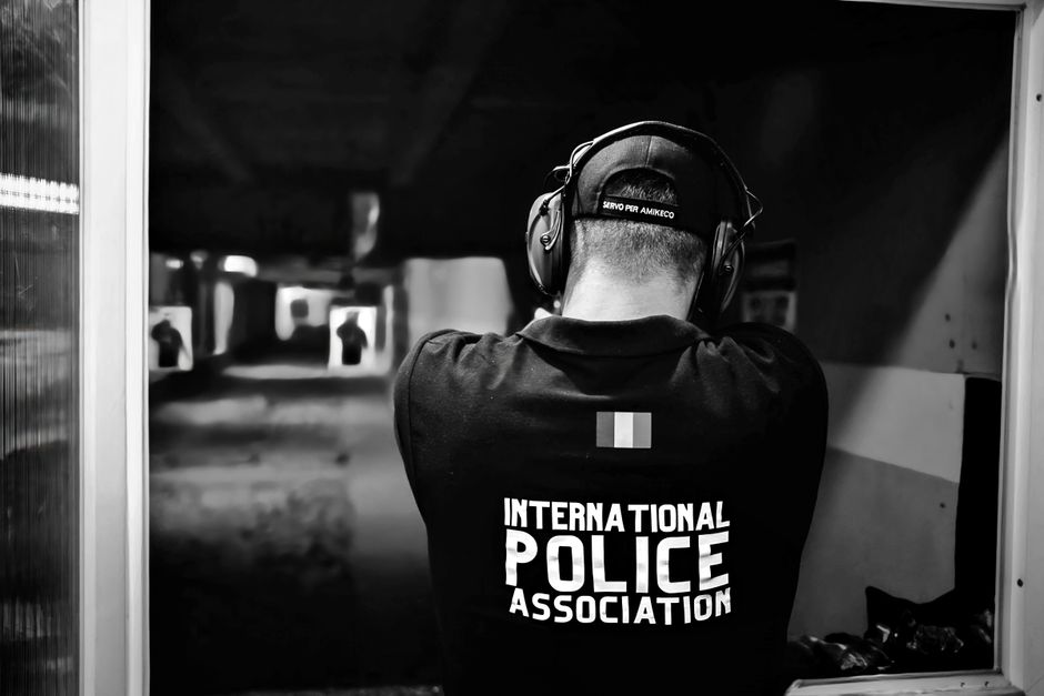 Law enforcement officers practicing firearms training at a shooting range