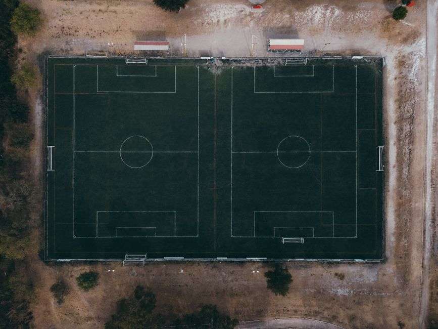 Aerial view of multiple side-by-side soccer fields at a county sports complex