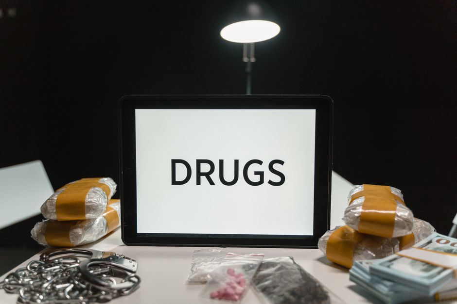 Police evidence representing a Mobile drug raid that seized marijuana, cash and a firearm