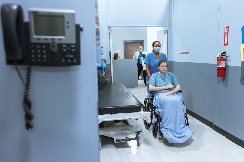 Hospital emergency entrance with medical staff