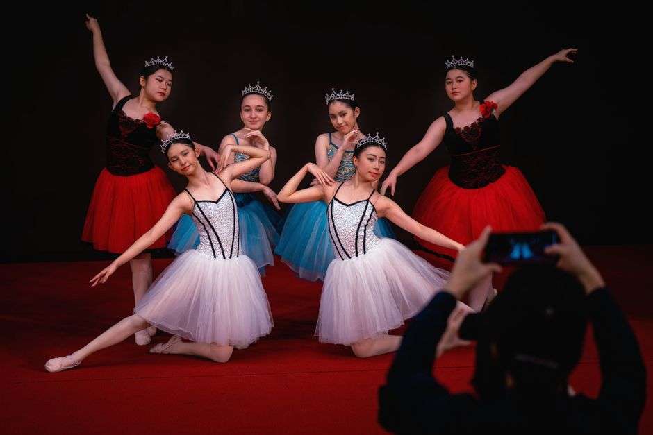 Dance performers on stage during a competitive dance showcase