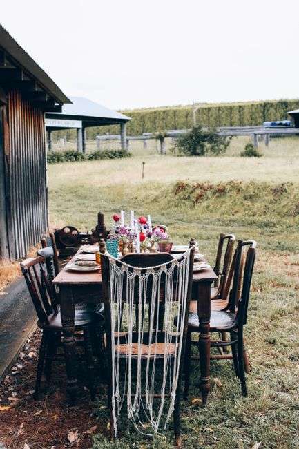 A farm-to-table style outdoor dinner setting with fresh local dishes