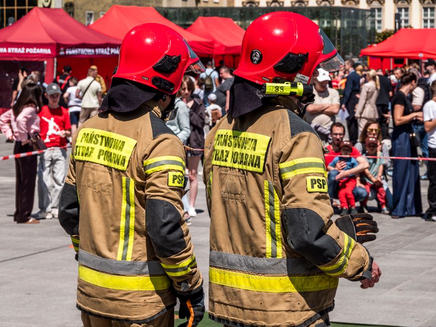 Firefighters in uniform standing together at a department ceremony