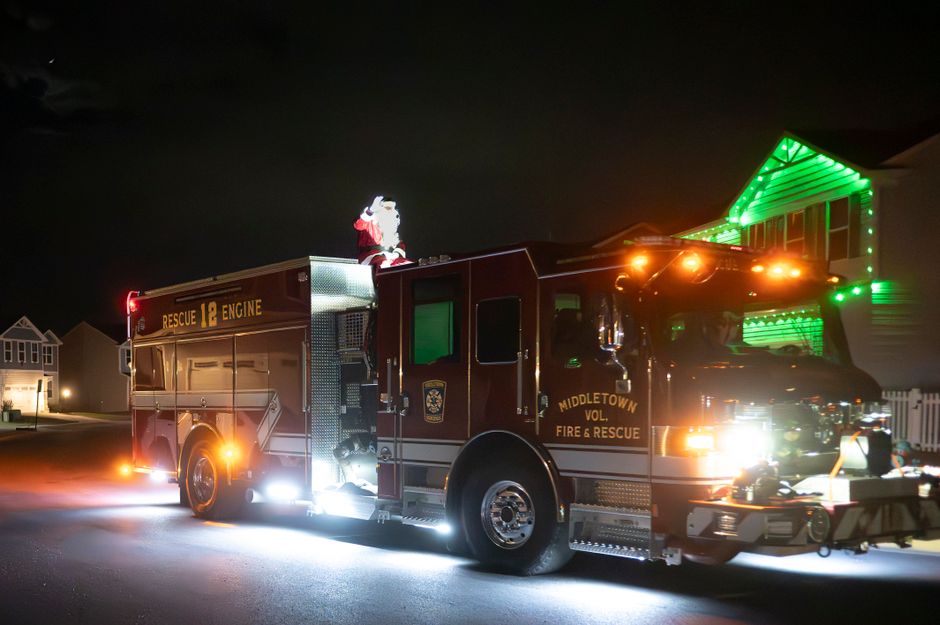 Volunteers delivering food to firefighters and first responders during the holidays