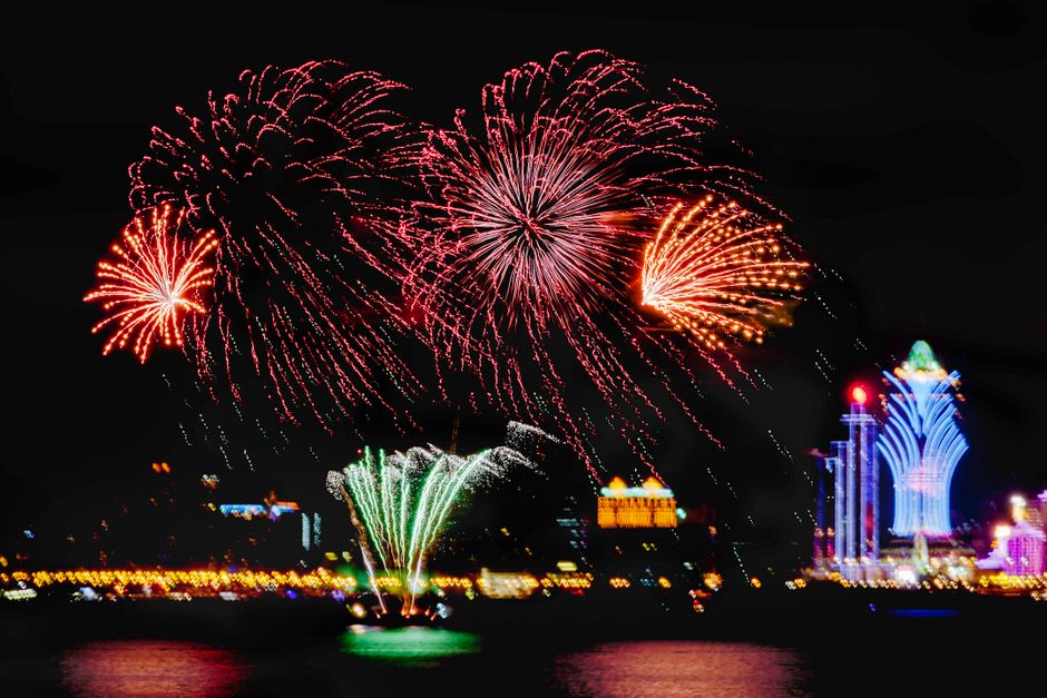 Fireworks lighting up the night sky over Battleship Parkway in Mobile, Alabama