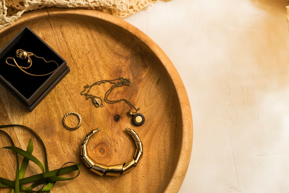 Gold rings and necklace representing jewelry at the center of a lawsuit