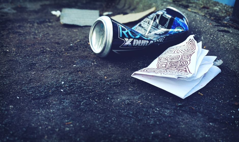 Trash and litter along a city street targeted for cleanup