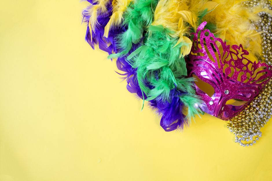 Colorful Mardi Gras float and costume display similar to the Mobile Museum of Art exhibition