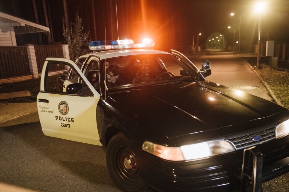 Police vehicle representing a Mobile Police Department arrest following a domestic disturbance call