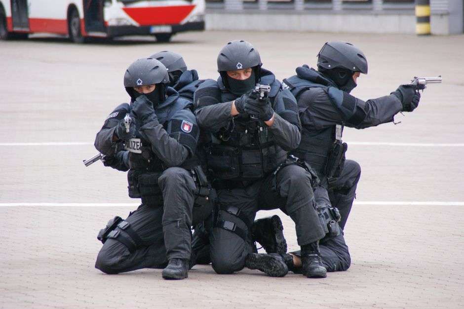 SWAT team officers in tactical gear during a training exercise