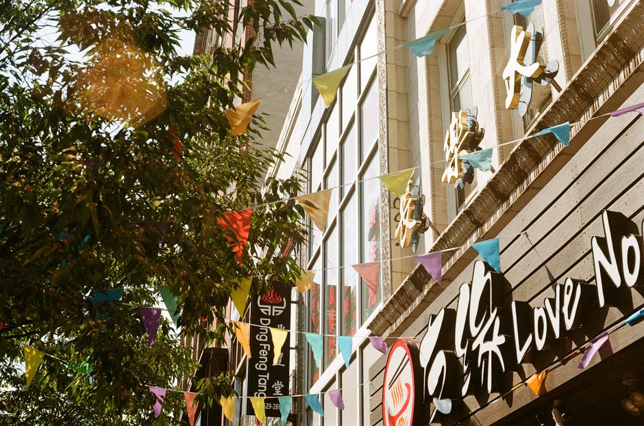 A banner hanging outside a downtown storefront