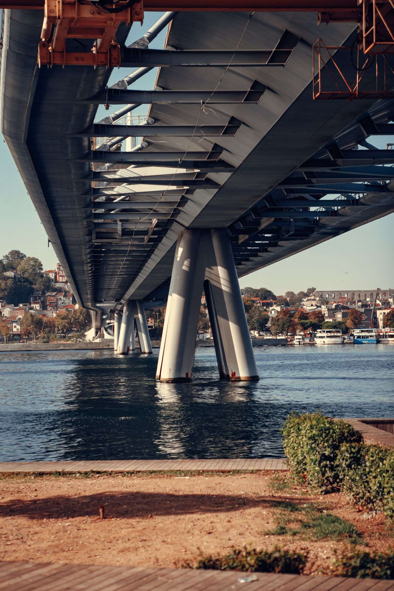 Bridge spanning a calm river, representing Mobile River Bridge infrastructure