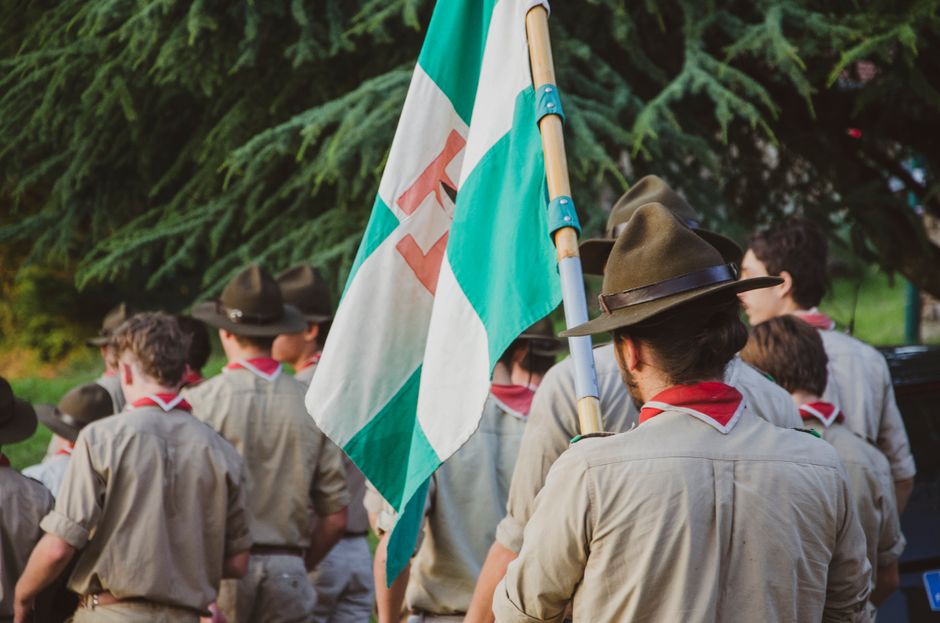 Boy Scouts troop members walking in a community event