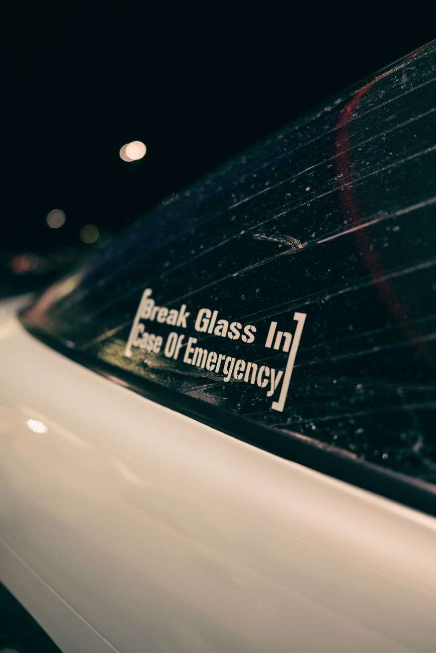 Car parked on a residential street at night