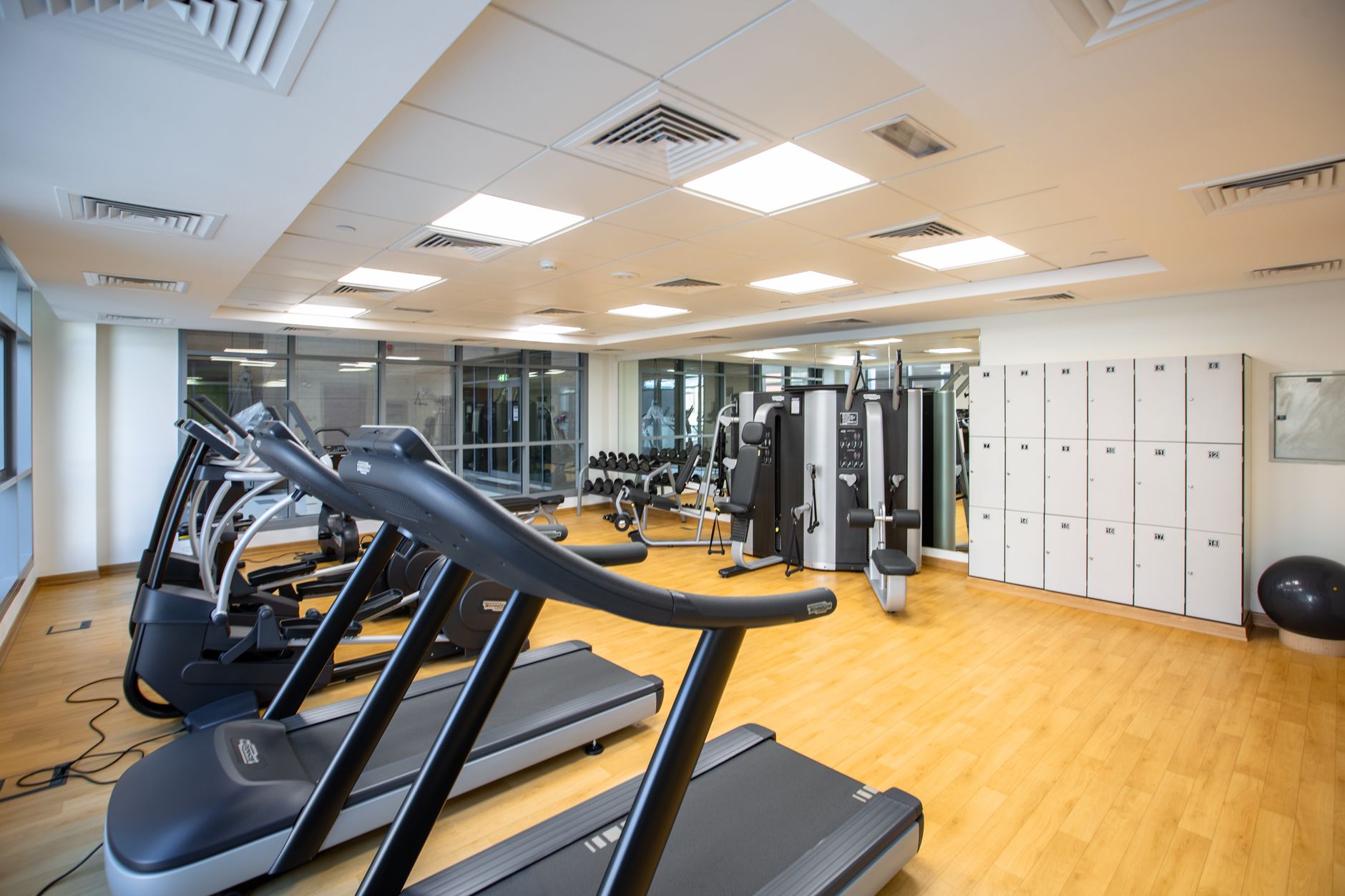 A fitness center with exercise equipment representing a YMCA branch