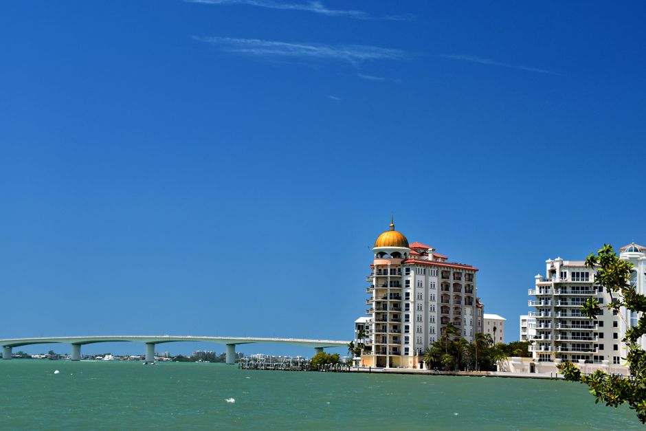High-rise condominium towers along a Gulf Coast beach