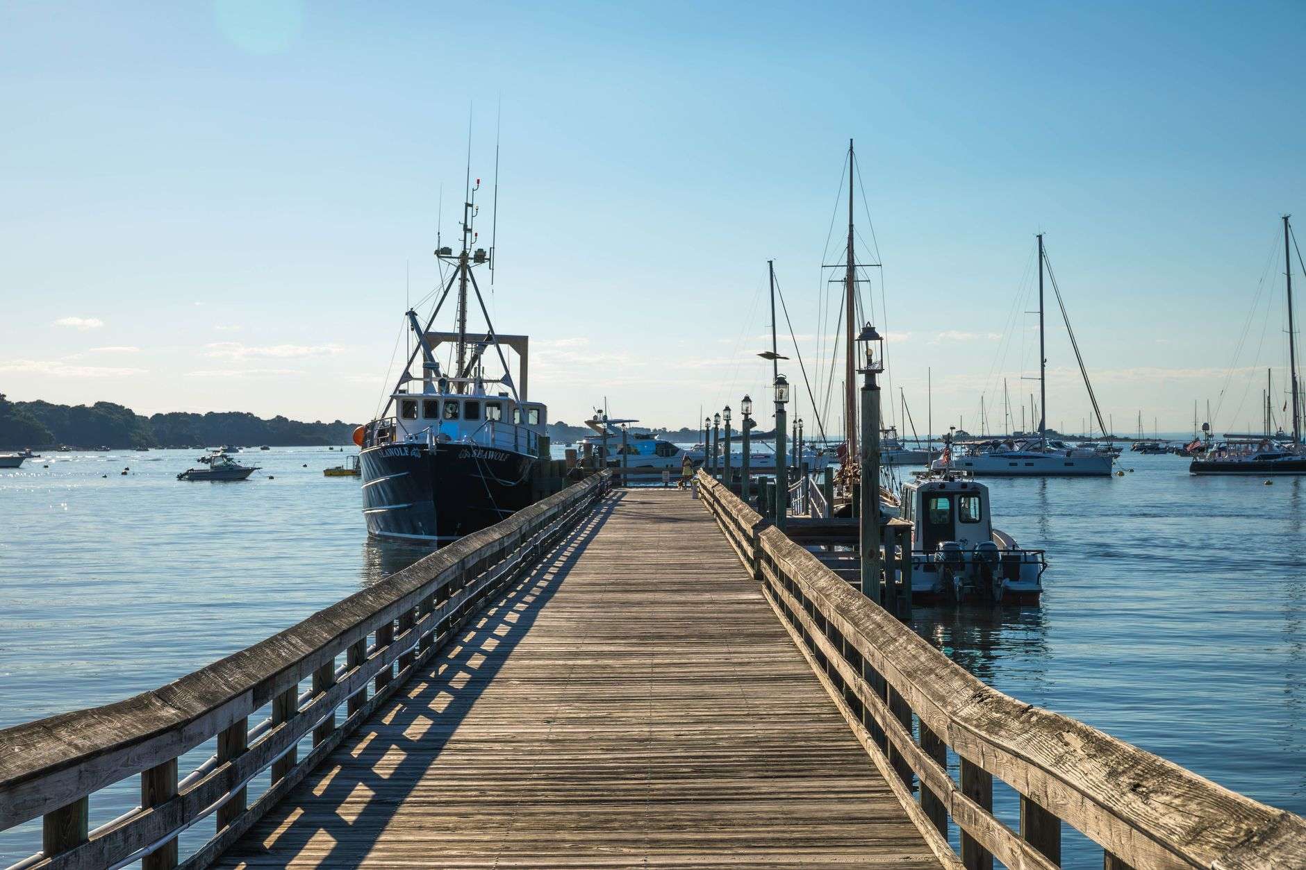 A boat resting near a coastal dock, similar to the vessel Orange Beach police helped return to its owner