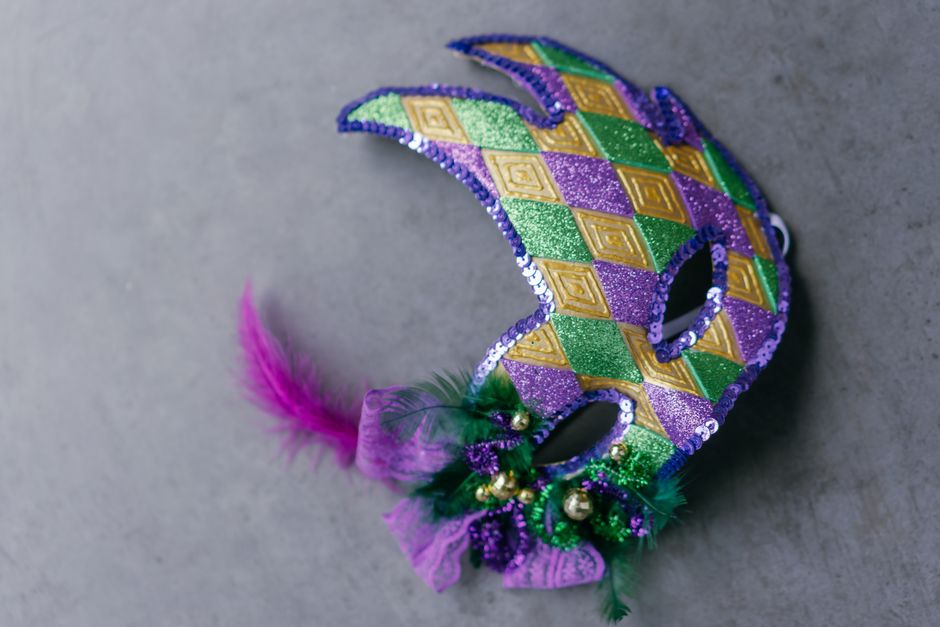 Colorful Mardi Gras costumes and celebration