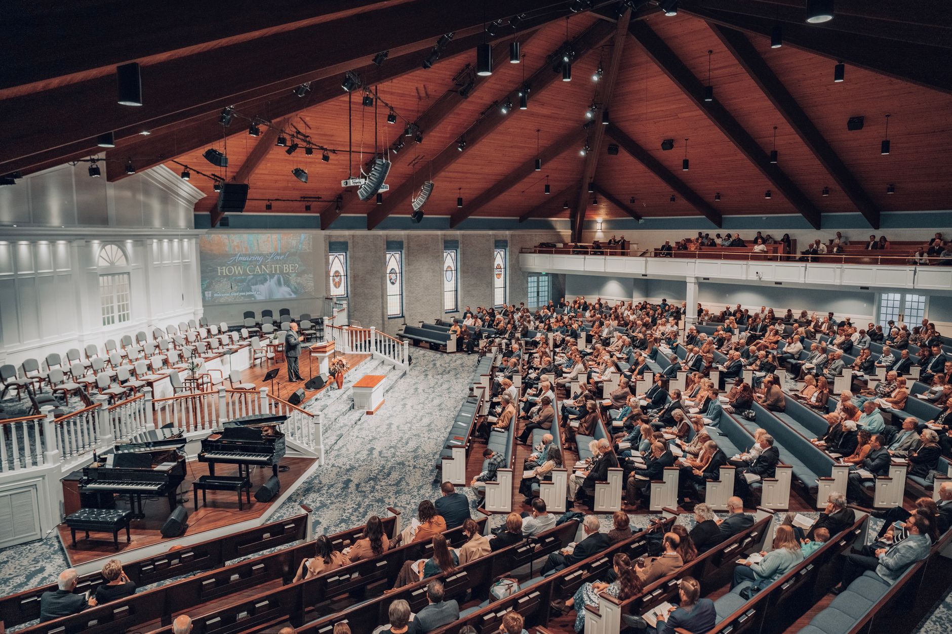 A community gathering inside a church hall