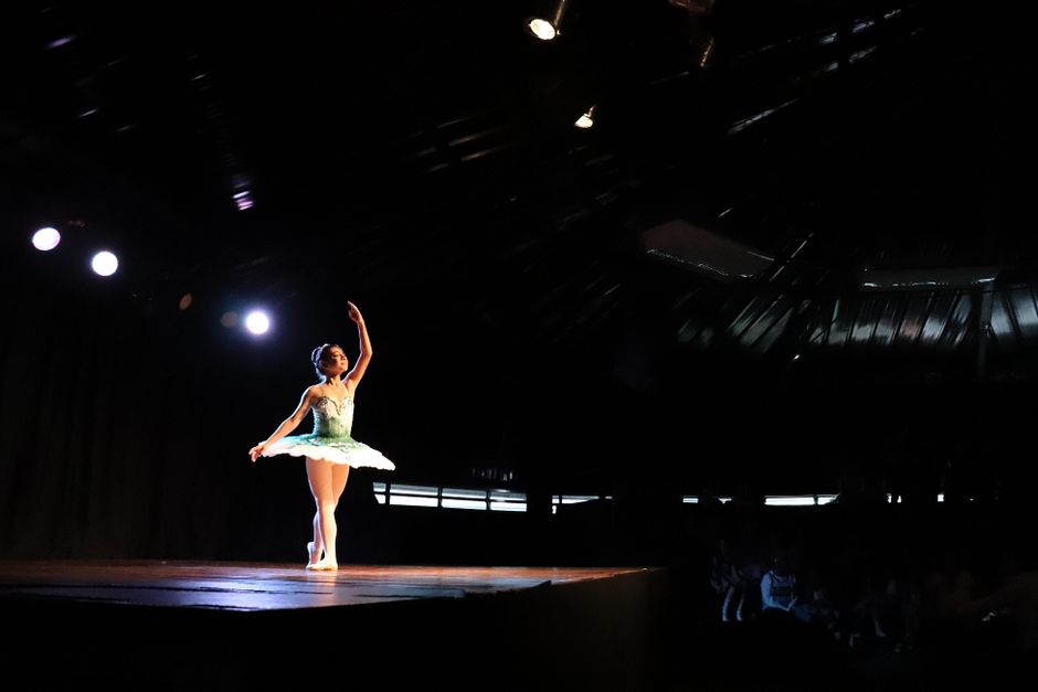 A dance performance scene representative of a J-Setting style routine