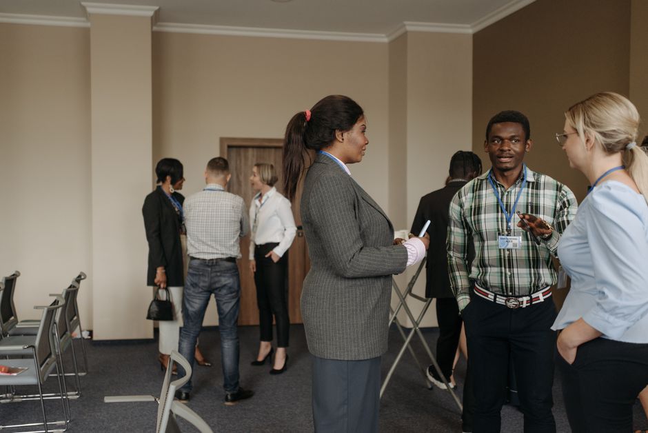Job seekers meeting with employers at a career fair