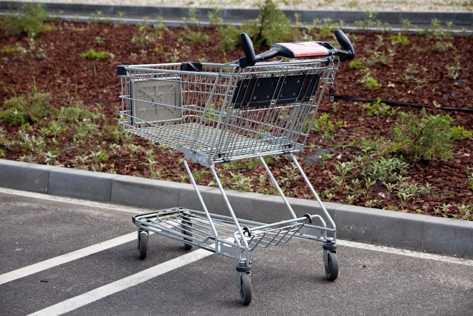 A grocery store parking lot on an overcast day