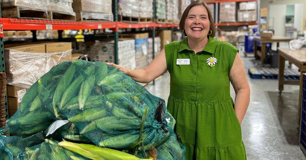 Food bank volunteers organizing food donations for distribution