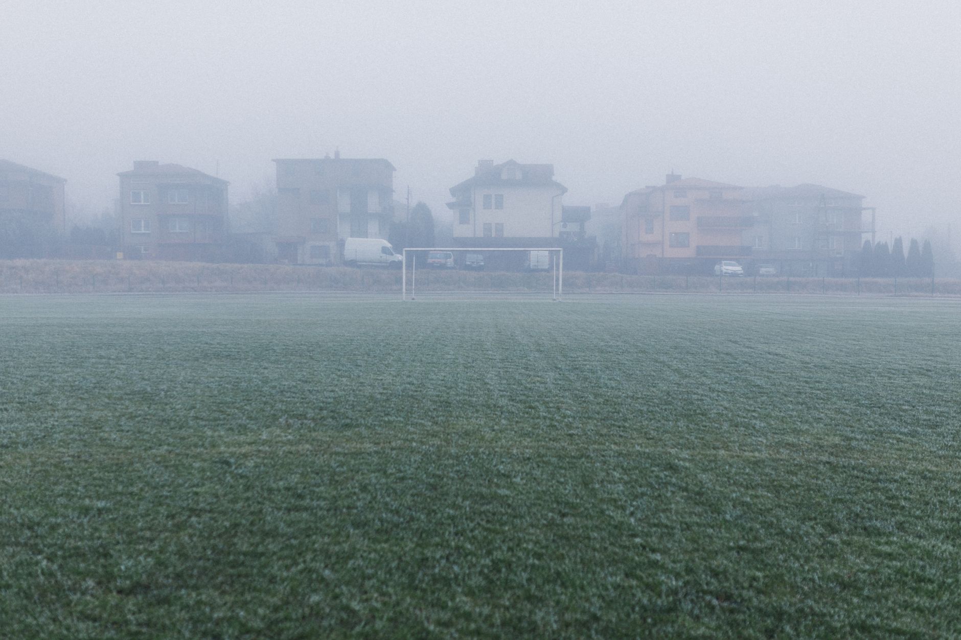 An empty soccer field representing youth sports facilities