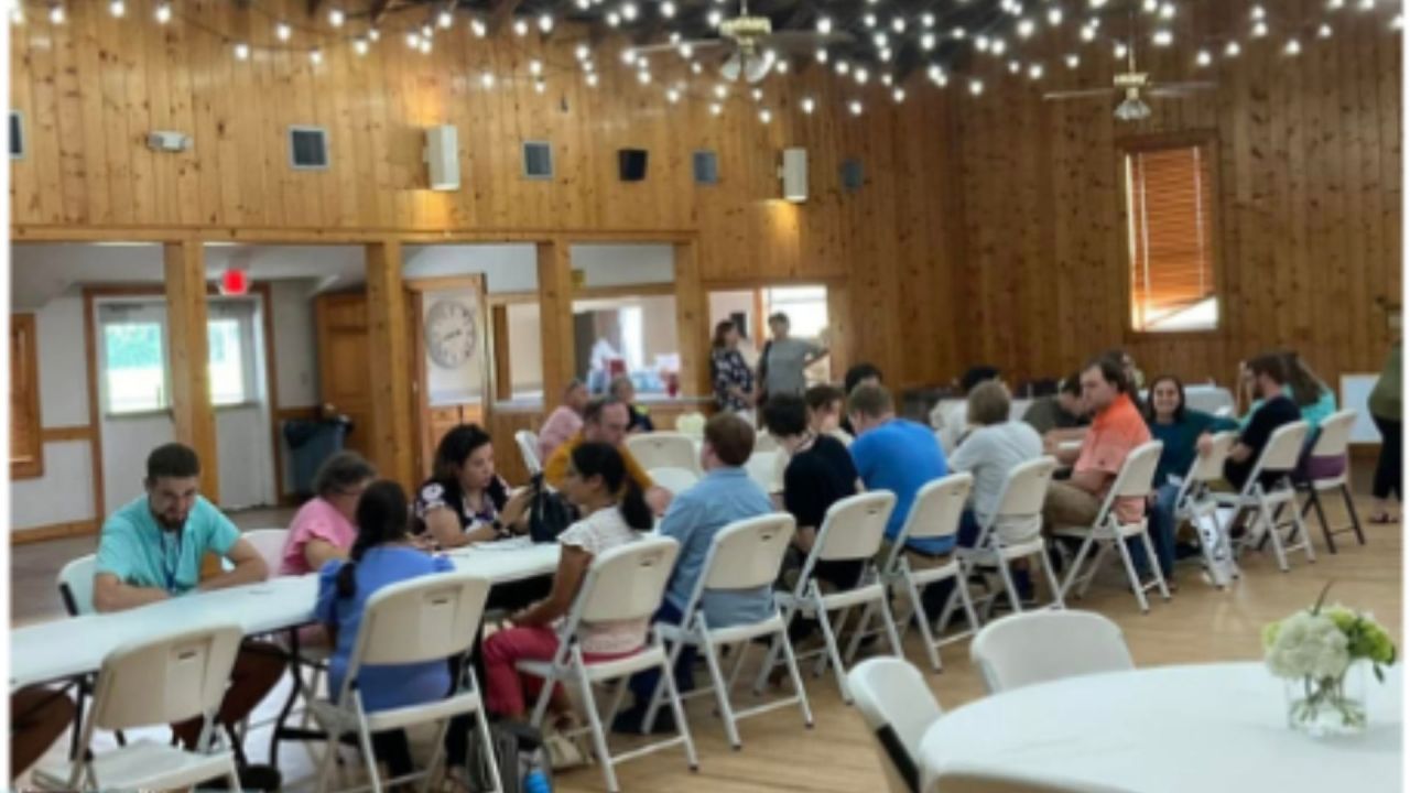 Families gathering at a community resource fair event