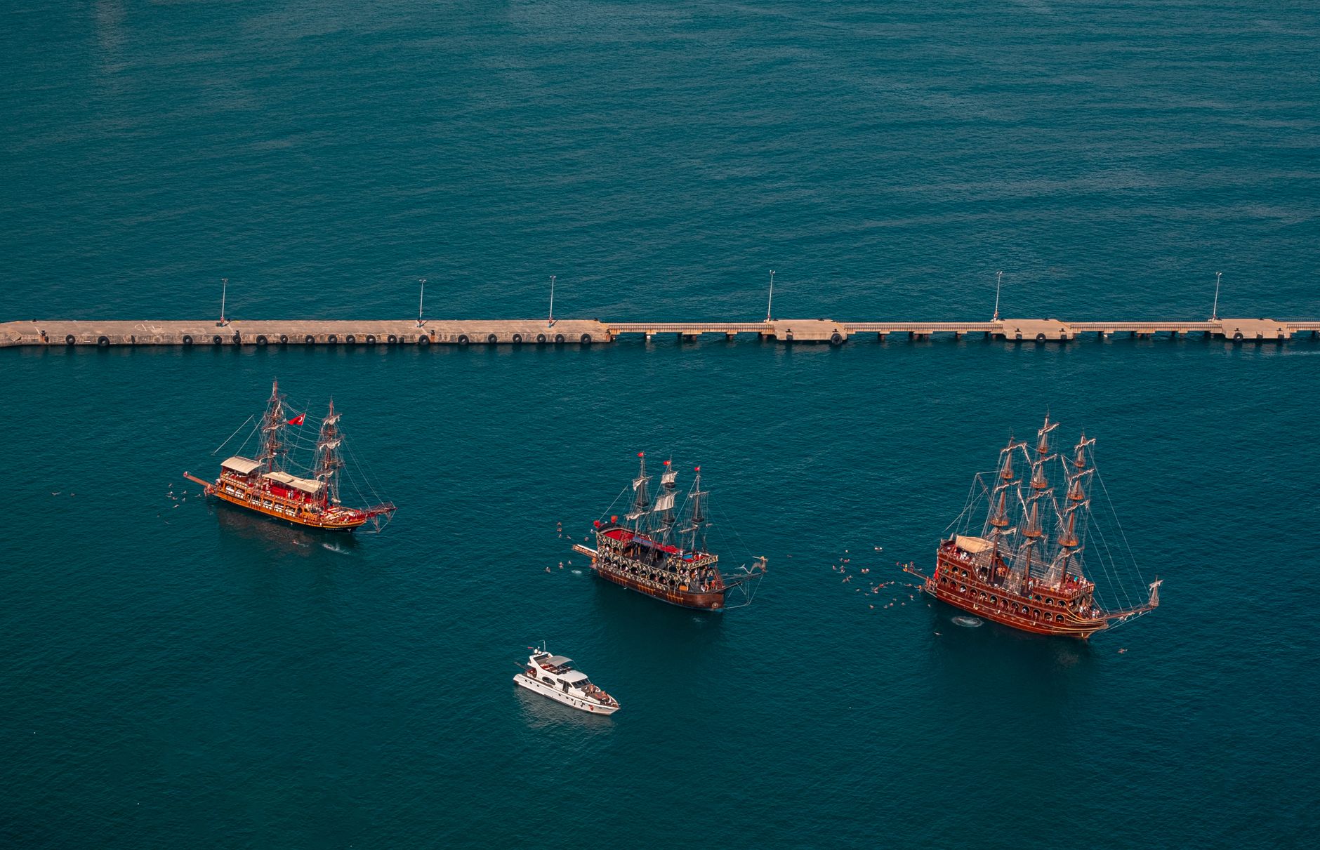 Civil War era sailing warships at anchor in a Southern harbor
