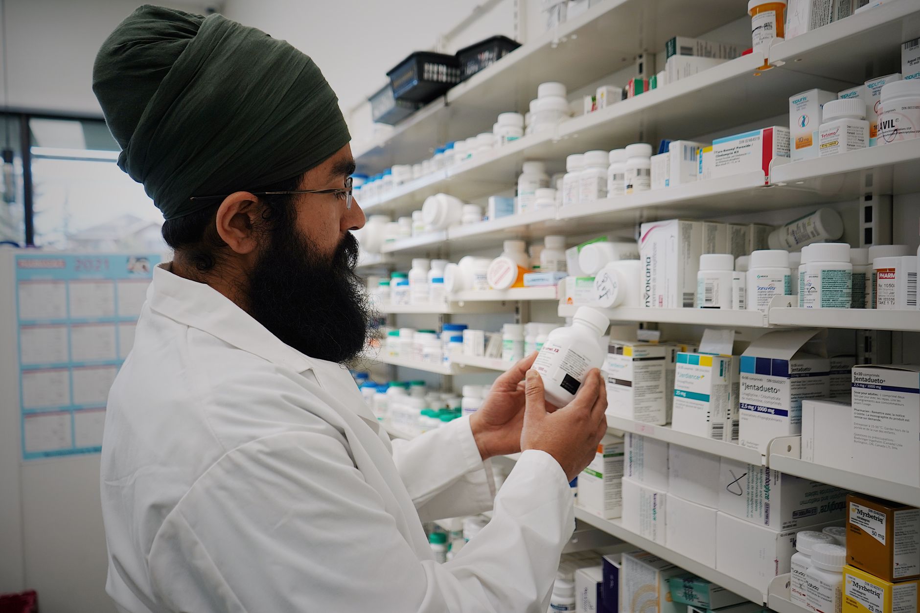 Boxes of cold medicine on a pharmacy shelf