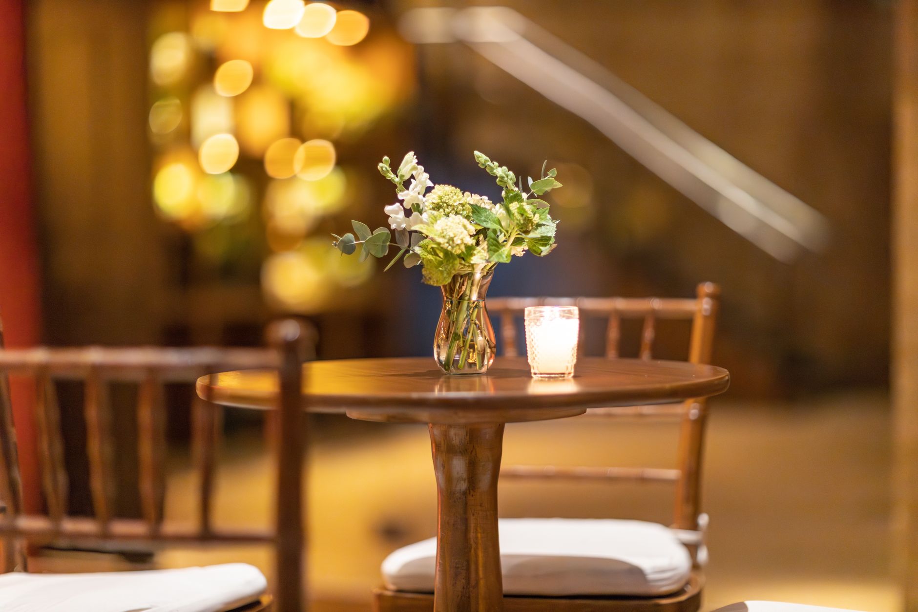 An elegant historic Southern home lit for an evening reception
