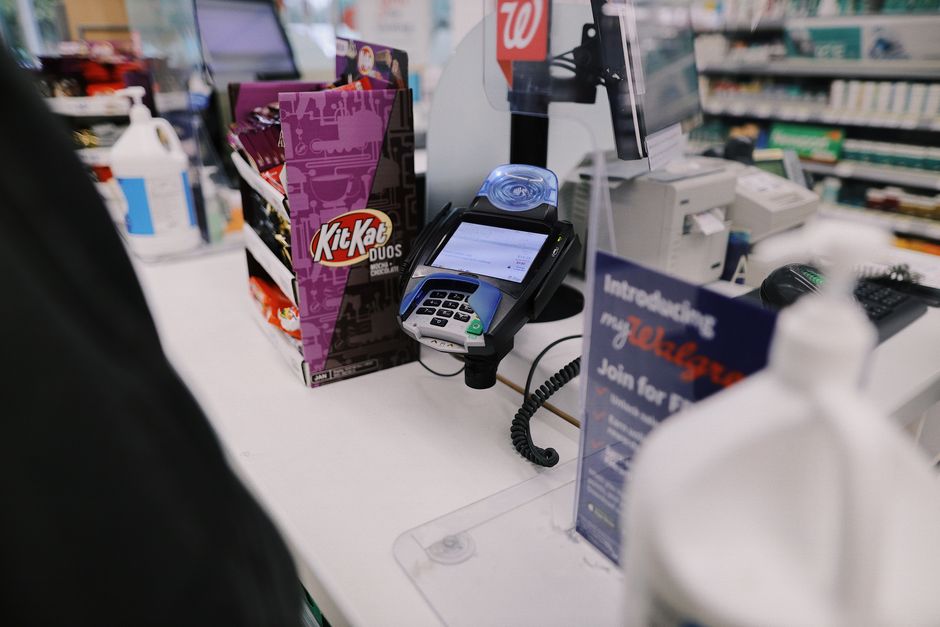 A store checkout counter where a distraction theft occurred