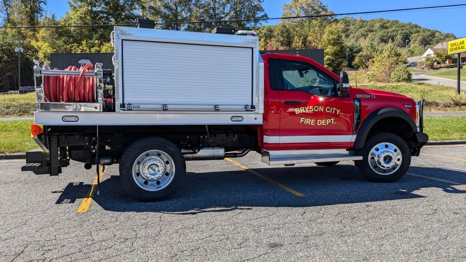 Fire truck at the scene of a rural grass fire