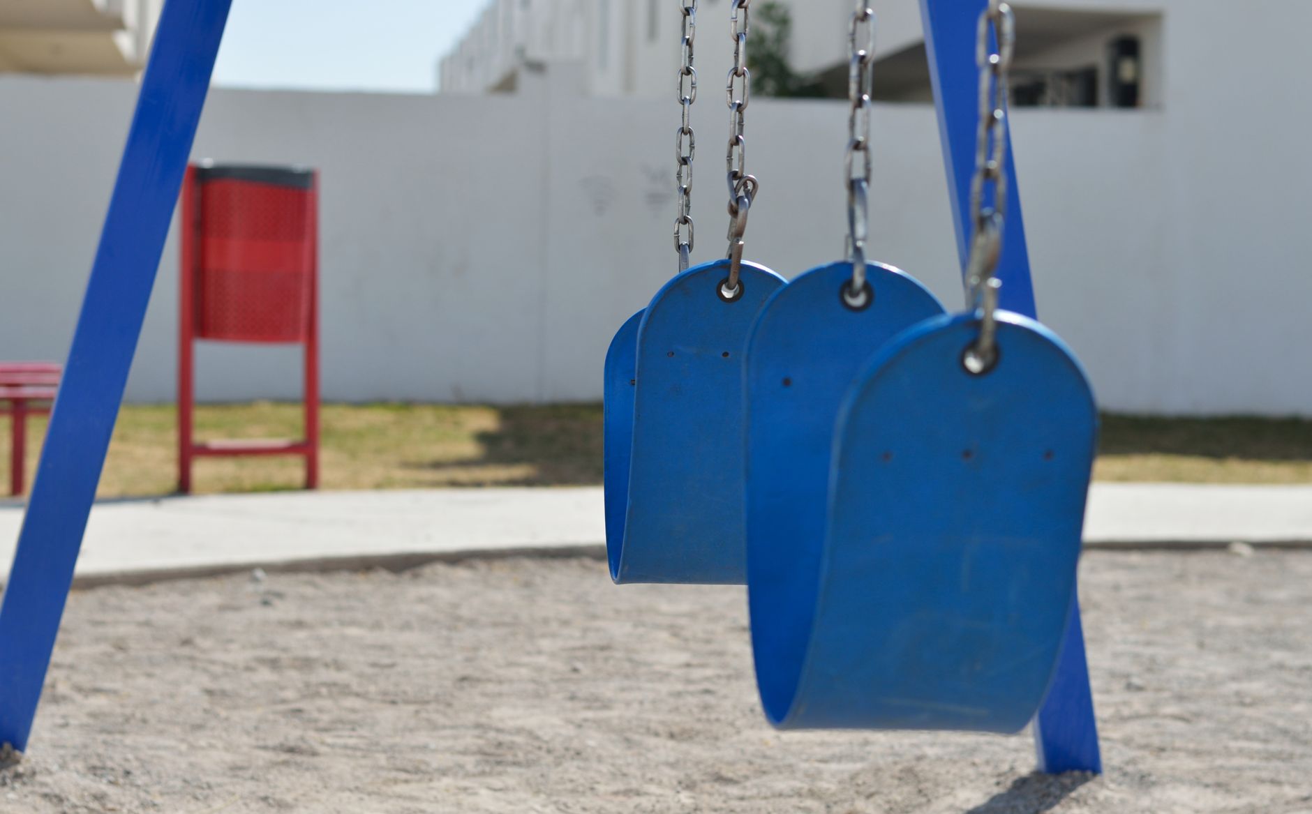 Playground equipment in a community park on a sunny day
