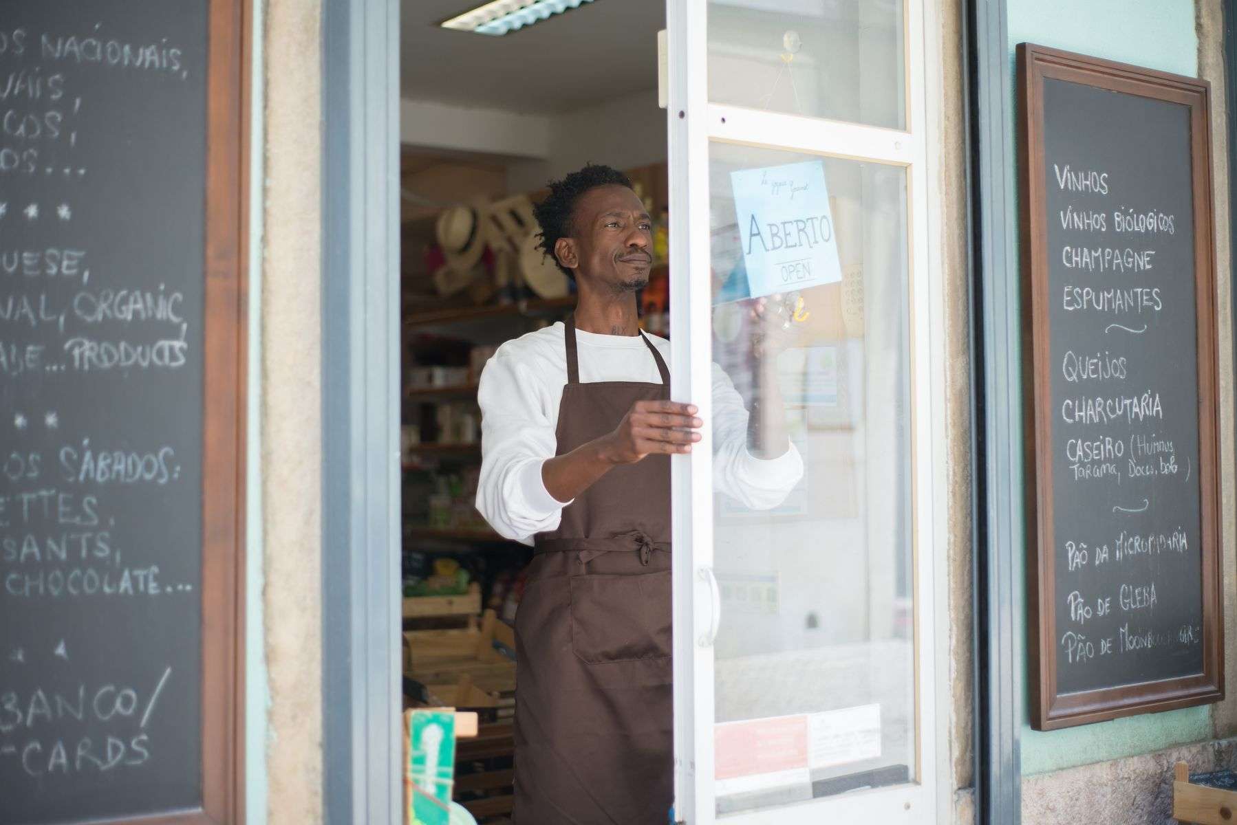 A small business owner working in their local shop