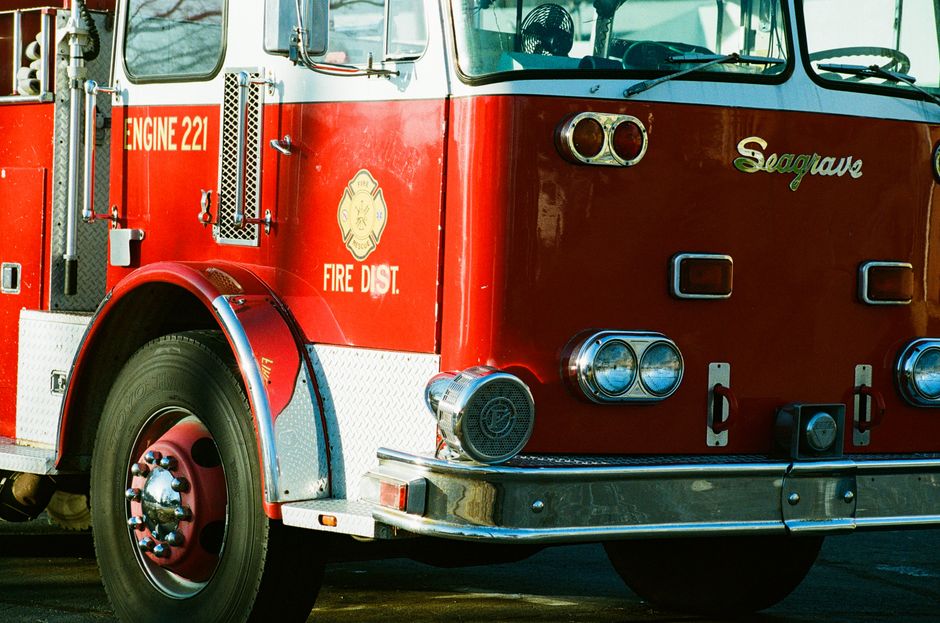 Fire department vehicle responding to a small fire at a school building